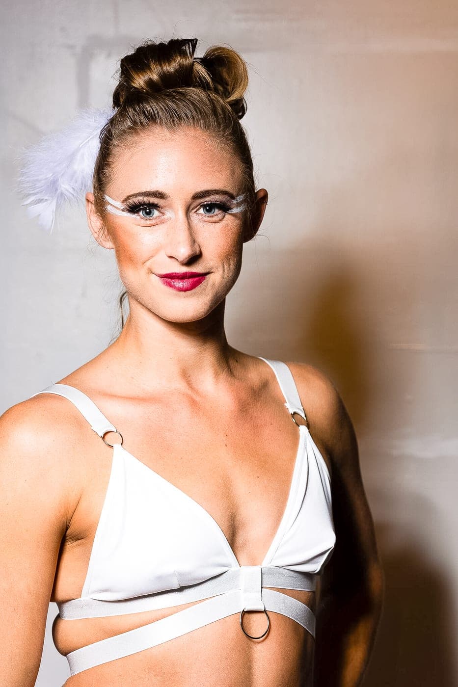 Katie Herndon in a white performance costume